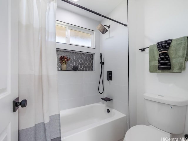 bathroom with toilet and shower / tub combo