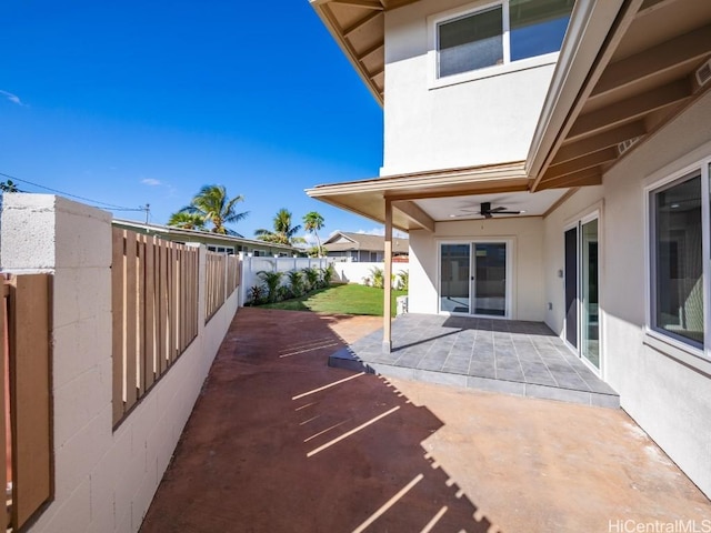 view of patio / terrace featuring ceiling fan