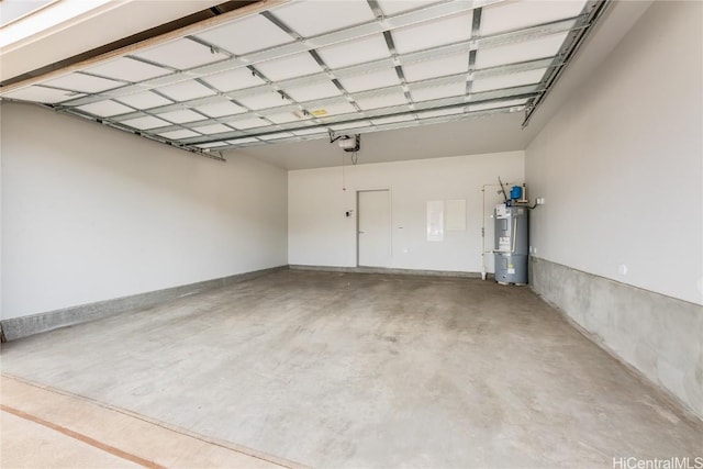 garage with water heater and a garage door opener