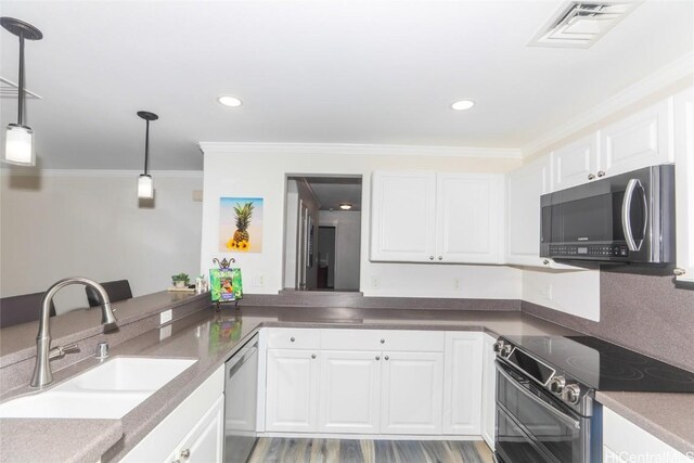 kitchen featuring sink, appliances with stainless steel finishes, decorative light fixtures, white cabinets, and ornamental molding