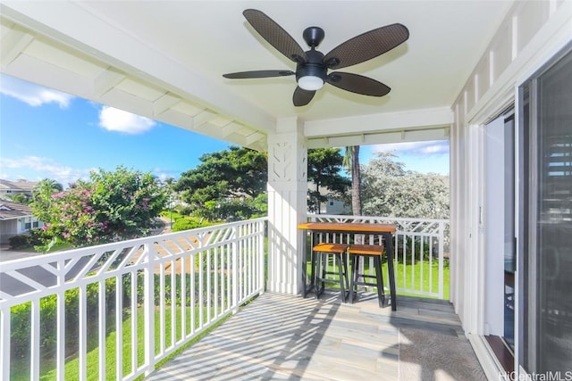 exterior space featuring a porch and ceiling fan