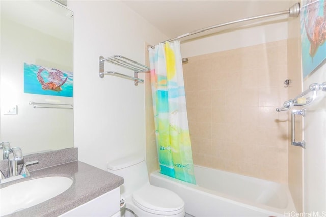 full bathroom featuring vanity, shower / tub combo, and toilet