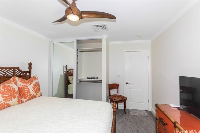 bedroom with ceiling fan and crown molding