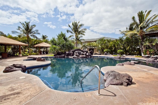 view of swimming pool with a gazebo and a patio