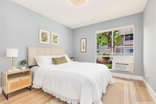 bedroom with light hardwood / wood-style floors