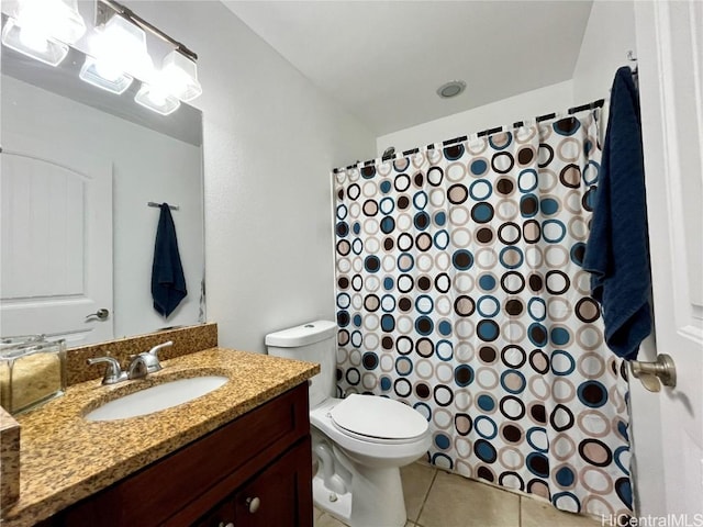 bathroom featuring a shower with curtain, tile patterned flooring, vanity, and toilet