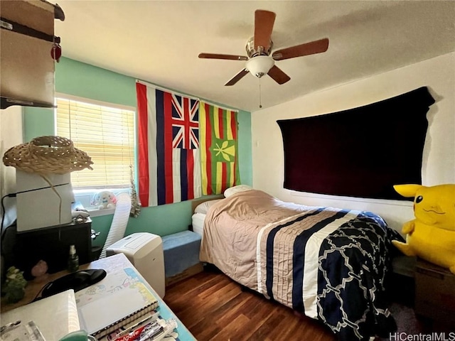 bedroom featuring ceiling fan and dark hardwood / wood-style flooring