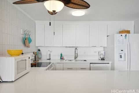 kitchen featuring white cabinetry, sink, ceiling fan, and white appliances