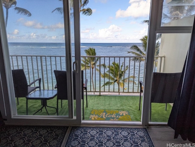 balcony featuring a water view