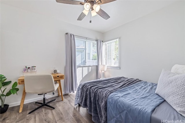 bedroom featuring ceiling fan and light hardwood / wood-style floors