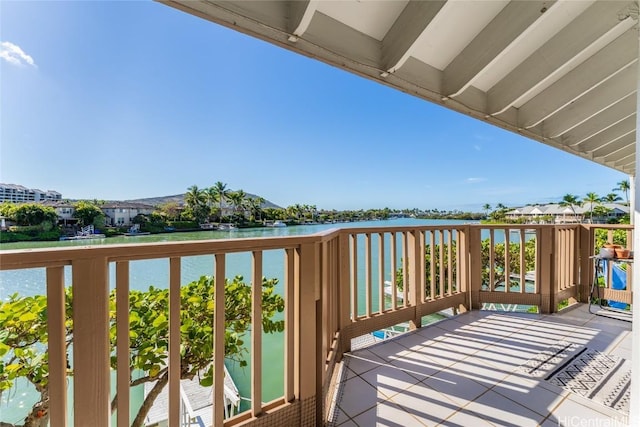 wooden deck with a water view