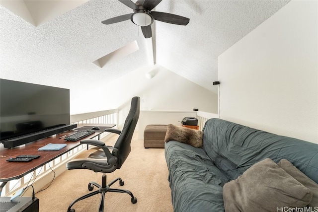 home office with light colored carpet, a textured ceiling, and vaulted ceiling