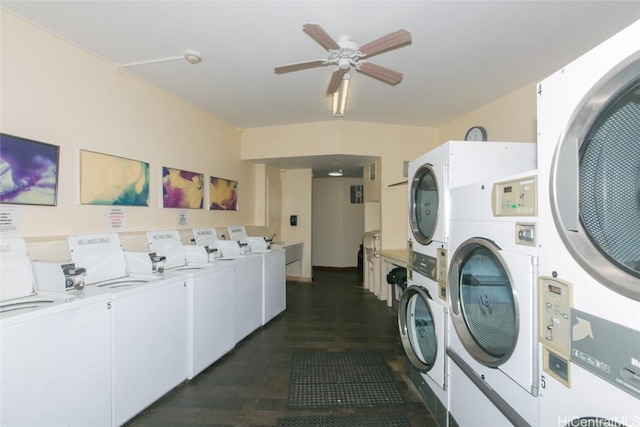 laundry room with ceiling fan, dark hardwood / wood-style flooring, stacked washer and dryer, and washing machine and clothes dryer