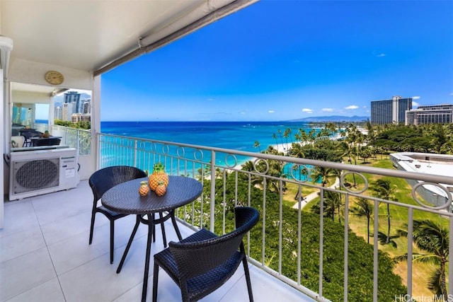 balcony featuring a water view