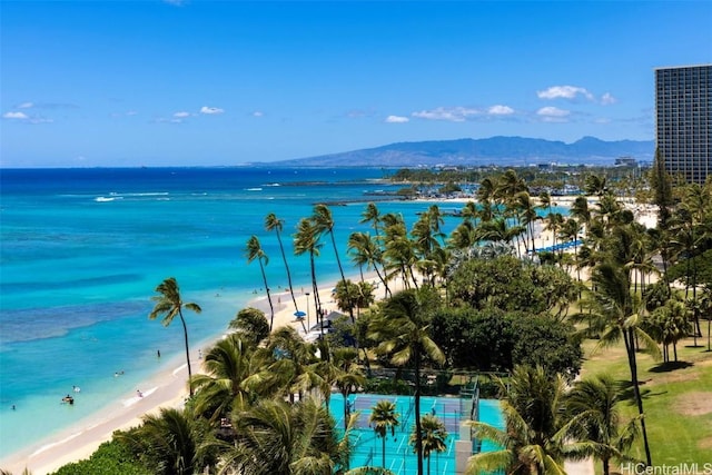 property view of water featuring a mountain view and a beach view