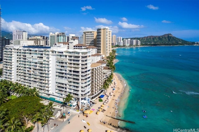 bird's eye view featuring a view of the beach and a water view