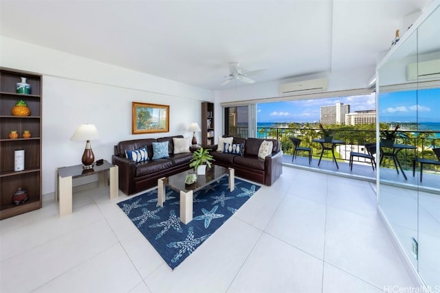 living room with tile patterned flooring, a wall unit AC, and ceiling fan