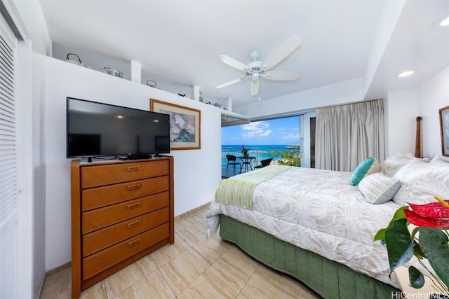 bedroom with access to exterior and ceiling fan