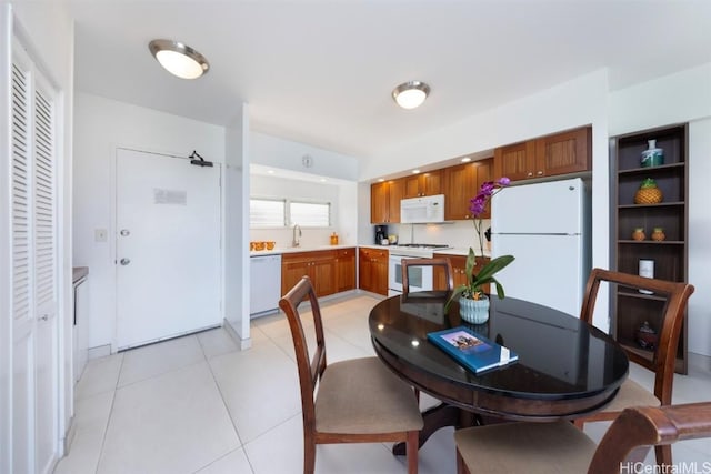 dining room with light tile patterned flooring