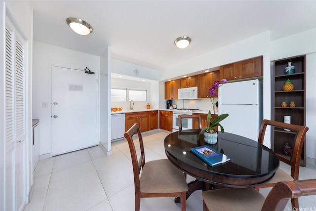 2161 Kalia Rd Unit 906, Honolulu, HI 96815 - dining area featuring light tile patterned floors