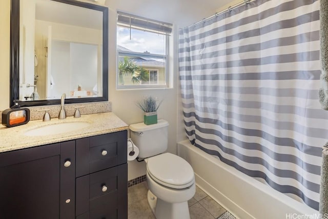 full bathroom featuring tile patterned flooring, vanity, shower / bath combination with curtain, and toilet