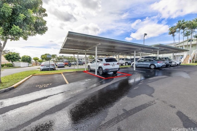 view of car parking with a carport