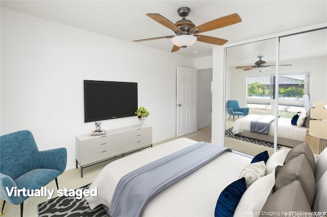 bedroom featuring a closet and ceiling fan