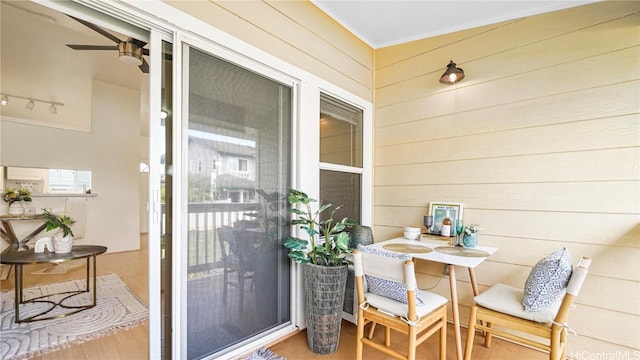 balcony featuring ceiling fan