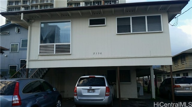 exterior space featuring a carport