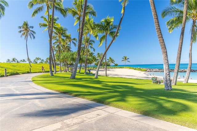 92-104 Waialii Pl Unit O523, Kapolei, HI 96707 - view of home's community with view of water and beach and a yard