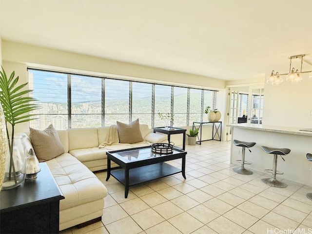 living area featuring light tile patterned flooring