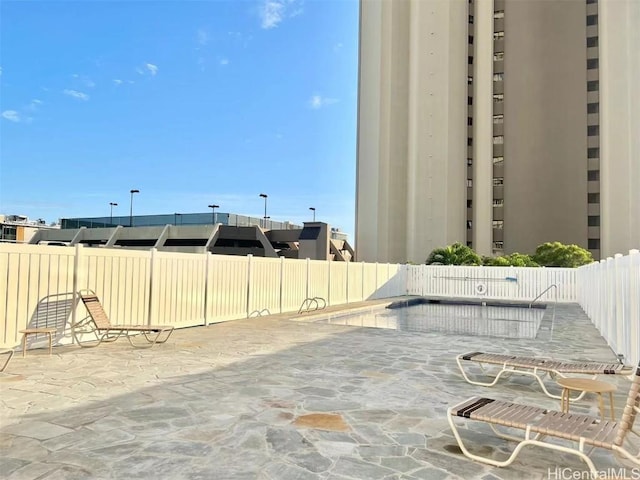 view of patio / terrace with fence