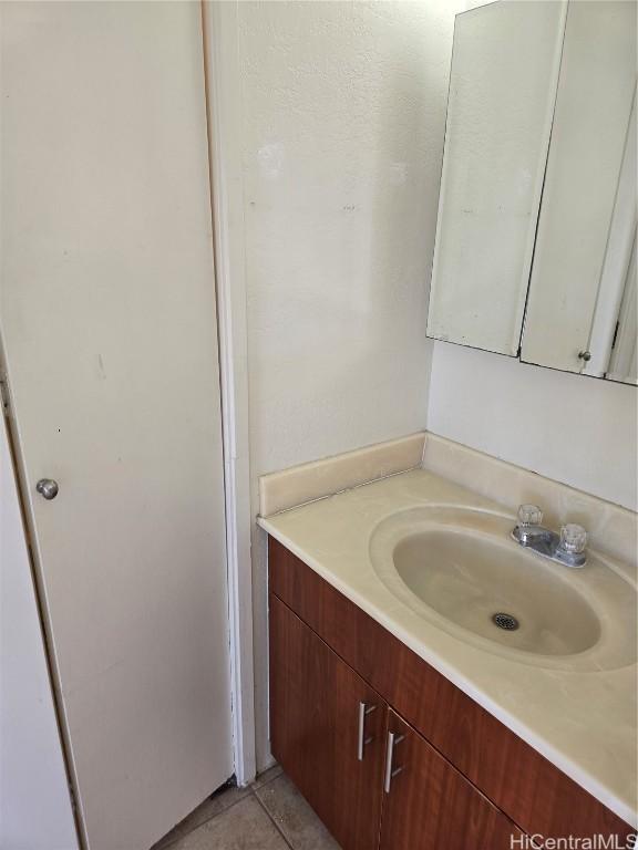 bathroom featuring vanity and tile patterned floors