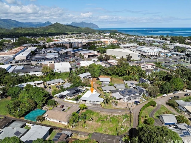 aerial view featuring a water and mountain view