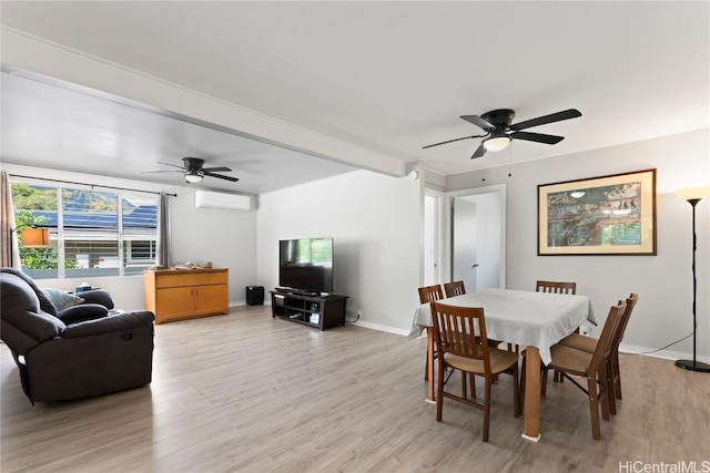 dining area with ceiling fan, a wall mounted air conditioner, and light wood-type flooring