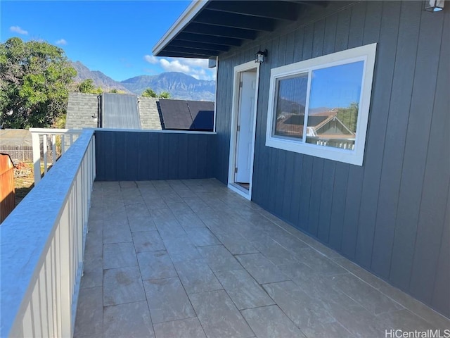 balcony featuring a mountain view