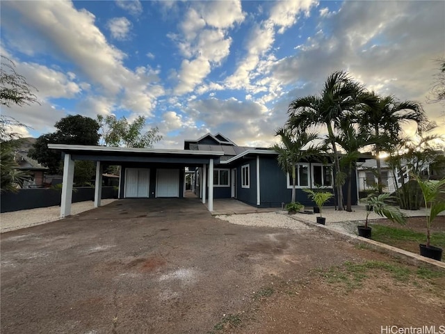 view of front of property with a carport