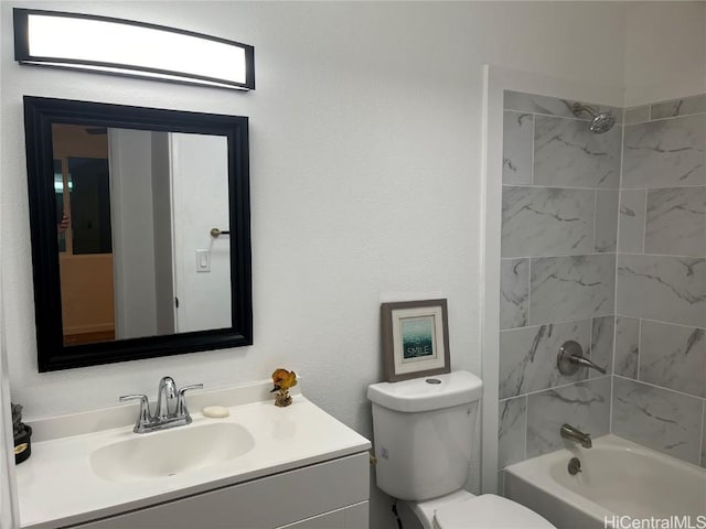 full bathroom with vanity, toilet, and tiled shower / bath