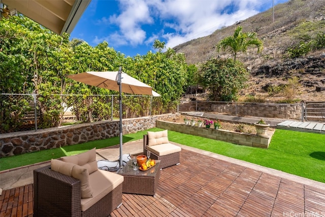 view of patio featuring a mountain view and an outdoor hangout area