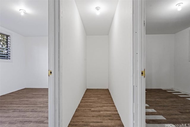 hall featuring dark wood-type flooring