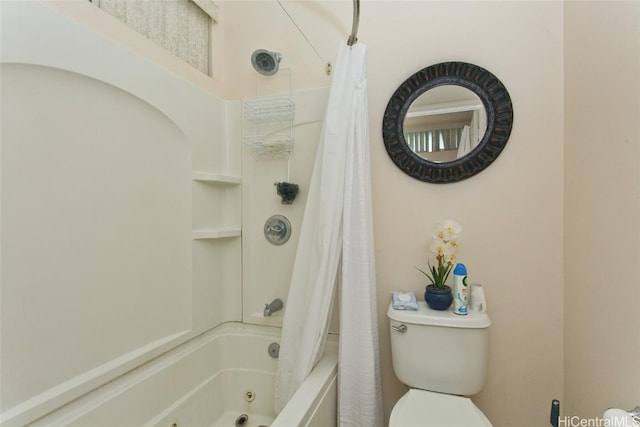 bathroom with toilet and shower / bathtub combination with curtain