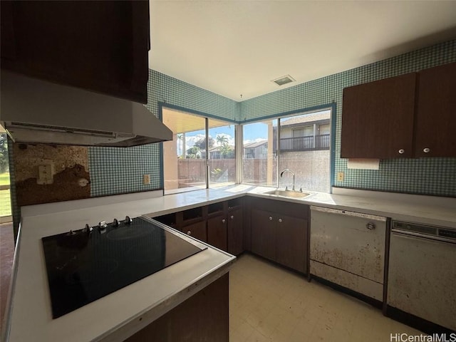 kitchen featuring black electric stovetop, dark brown cabinets, sink, exhaust hood, and dishwasher