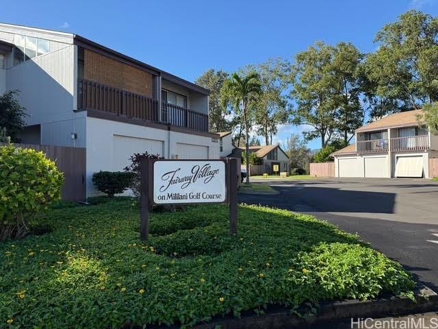 view of community / neighborhood sign