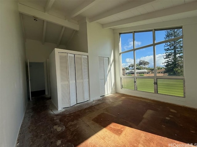 interior space with lofted ceiling with beams