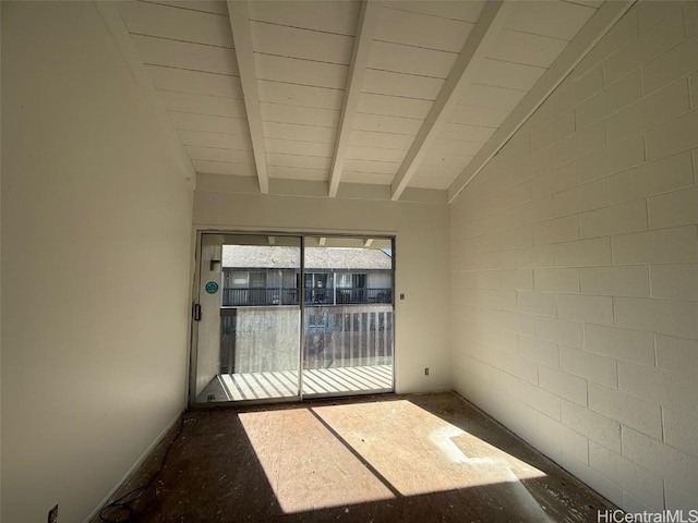 interior space with vaulted ceiling with beams