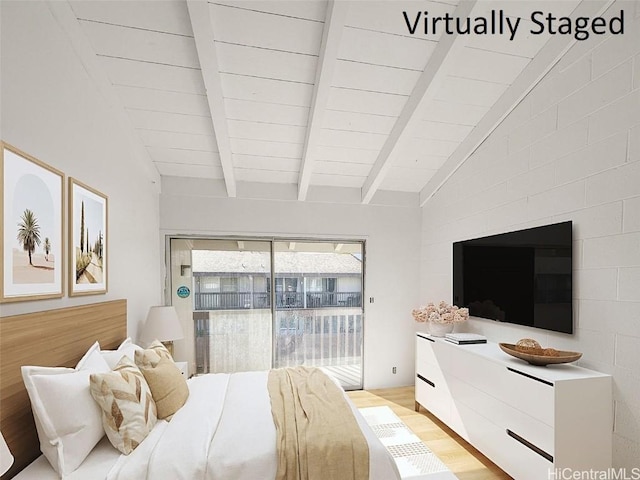 bedroom featuring vaulted ceiling with beams, light wood-type flooring, and access to outside