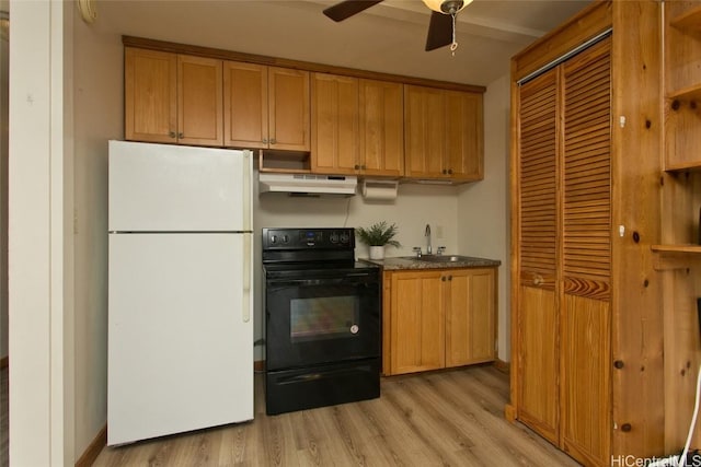 kitchen featuring electric range, sink, ceiling fan, white refrigerator, and light hardwood / wood-style floors