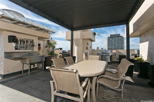 2345 Ala Wai Blvd Unit 1906, Honolulu, HI 96815 - view of patio / terrace with outdoor dining area and area for grilling