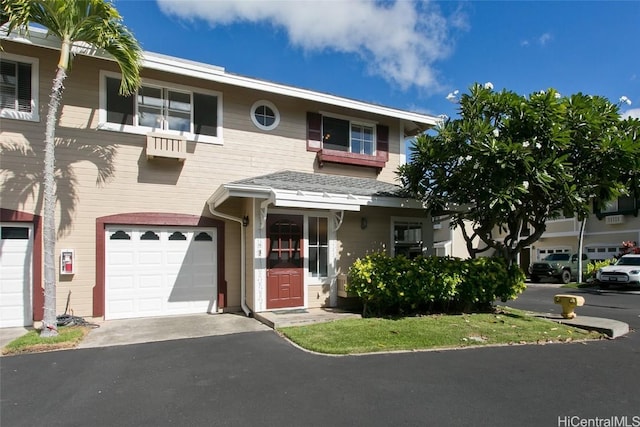 view of front of property featuring a garage