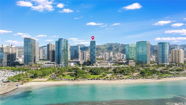 view of city featuring a view of the beach and a water view